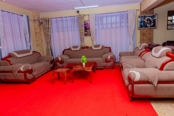 Elegant 7-Seater Sofa Set with Carved Mahogany Accents